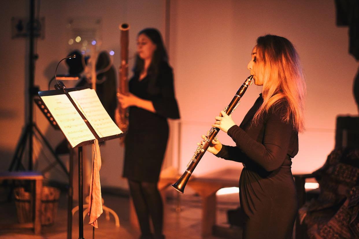 Charlotte Curwen (Background) and Emma Haughton (Foreground) of Camira Wind Trio Perform